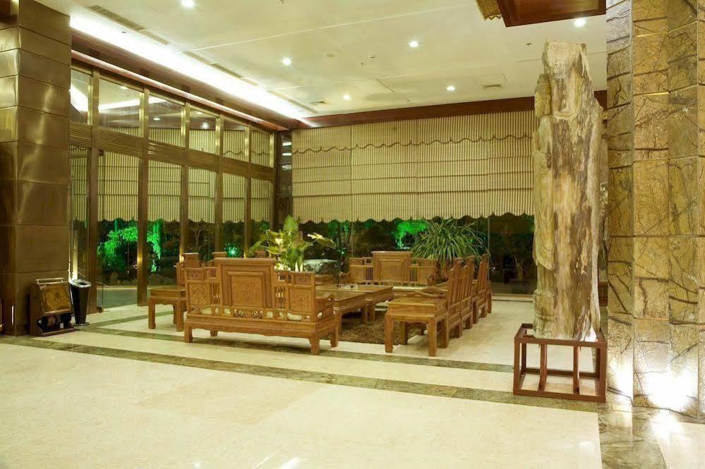 Golden Zone Hotel Jinghong Exterior photo